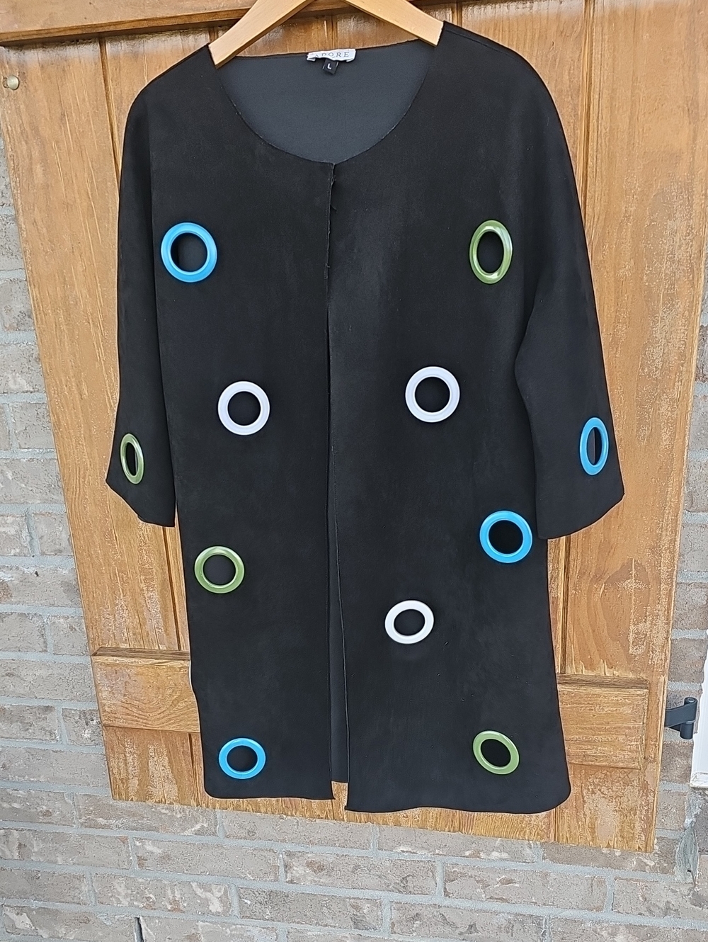 Adore Black Faux Suede Trench Coat with Blue, Green and White Ring Accents